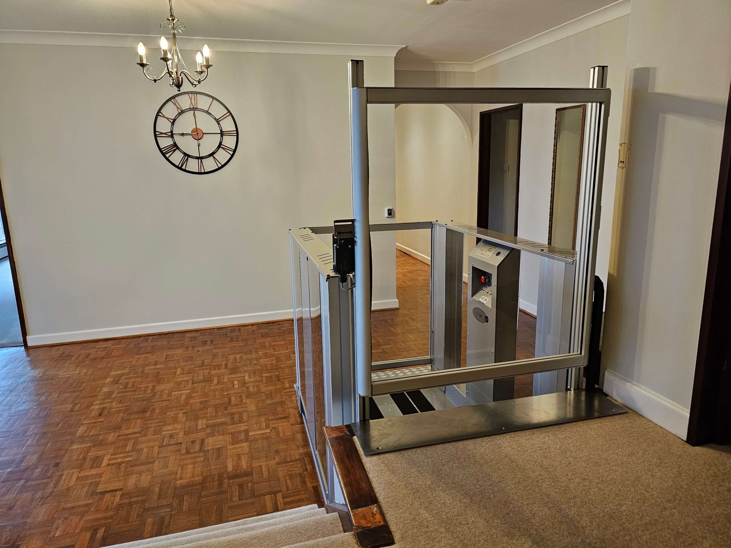 Platform steplift in a hallway providing access to split level