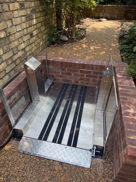 Step lift in a garden providing access to an upper level.