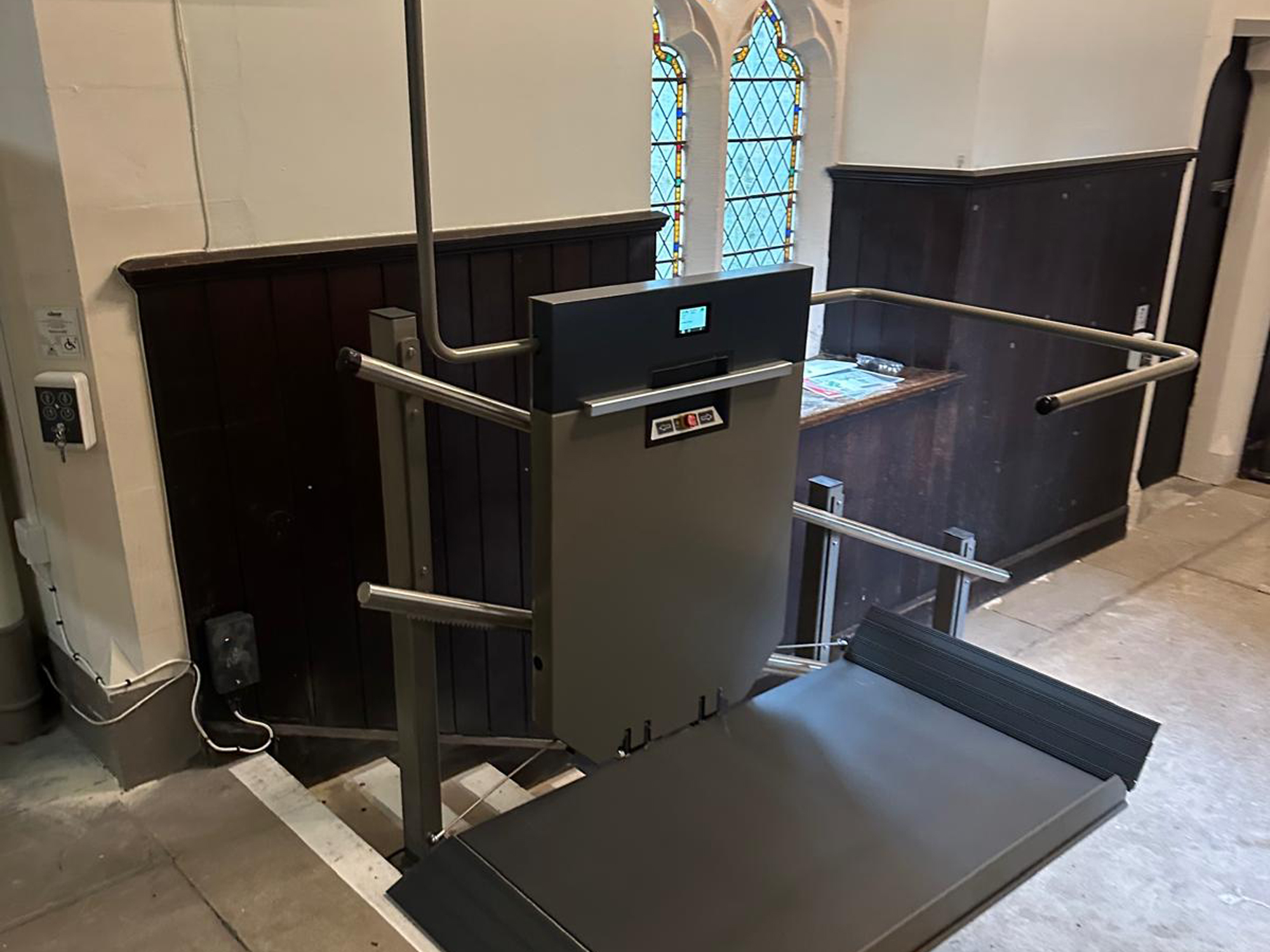 GTLE platform stair lift with platform deployed showing control panel and guard rails, Ushaw Historic House chapel interior