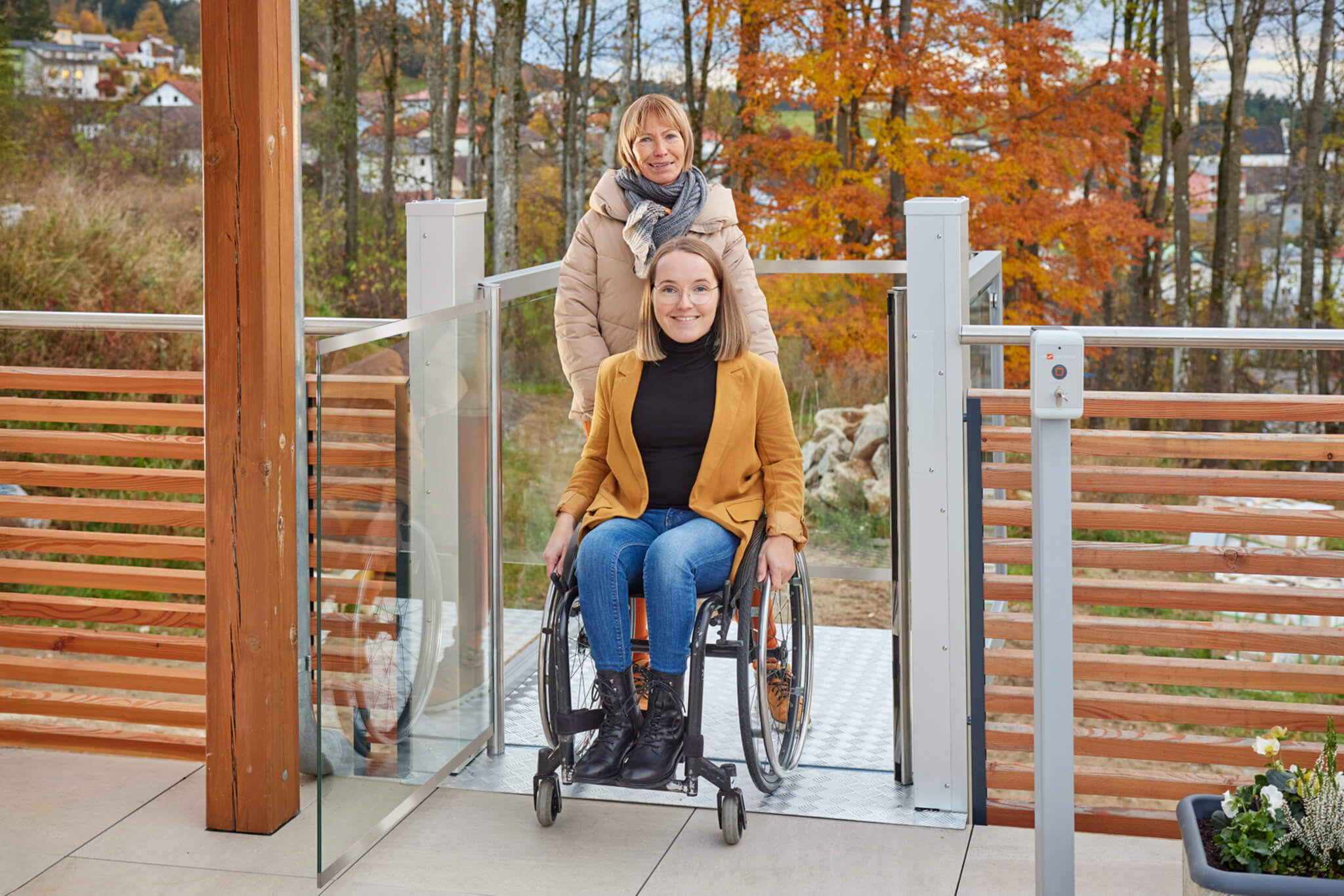 Person in wheelchair using a platform lift