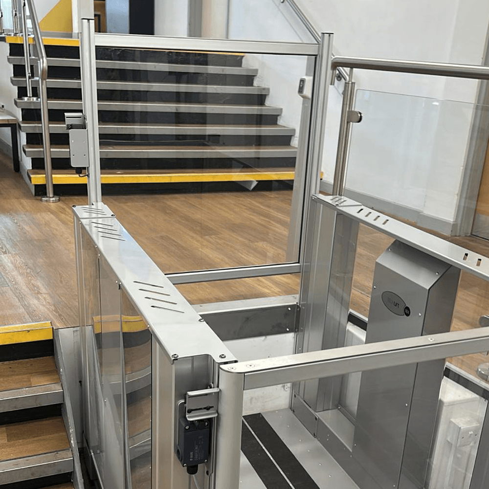 Platform step lift for schools at Stamford College installed alongside the existing staircase.